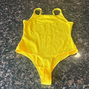 Levi’s Bright Yellow Ribbed Bodysuit large